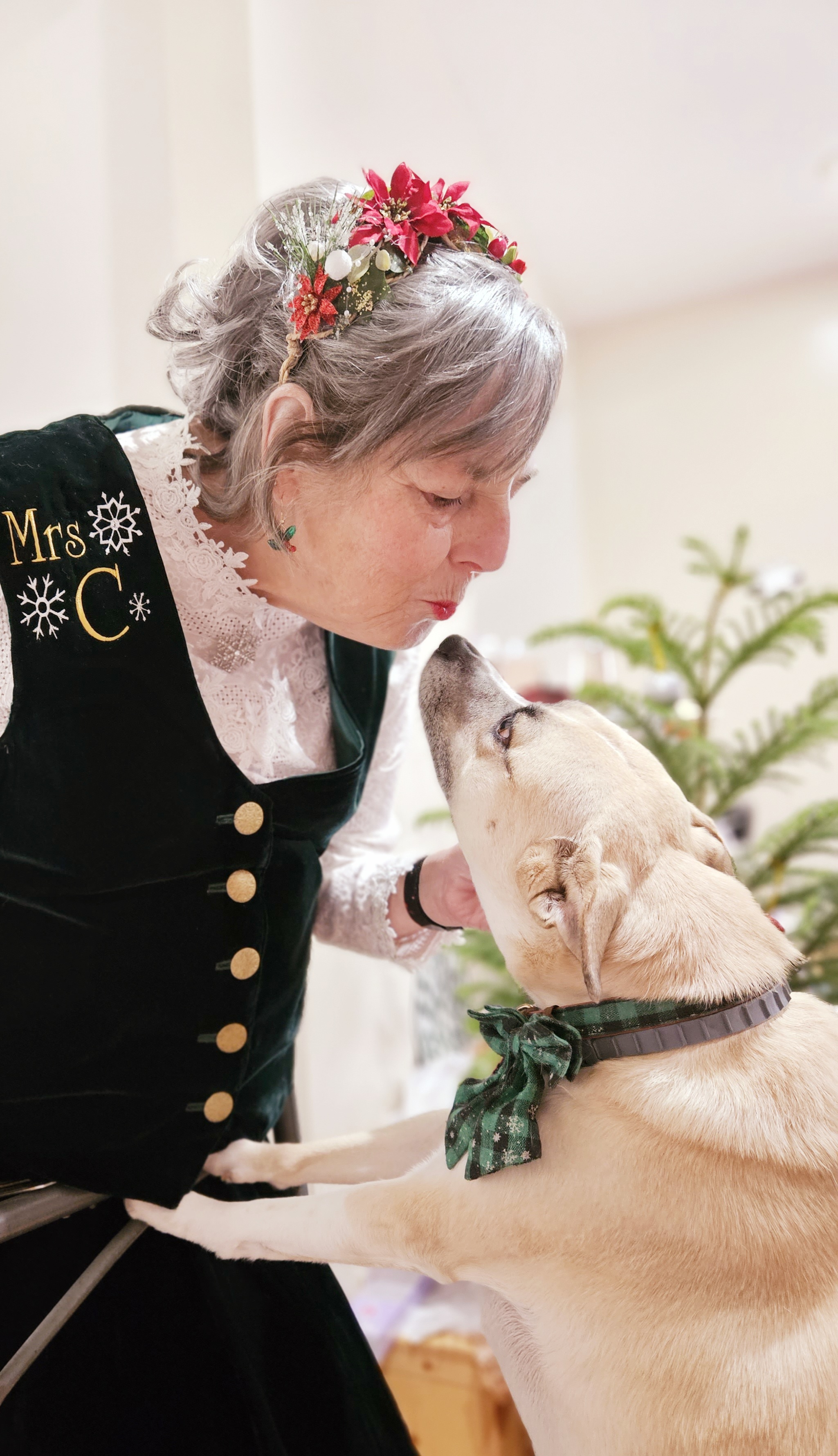 Mrs. Claus with service dog